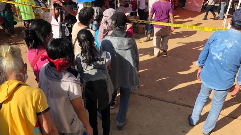 Relatives wait for the agonizing news of their loved ones' fates.