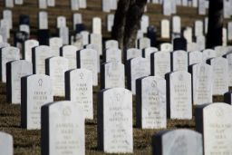 Granite government tombstones mark the graves of veterans at the Santa Fe National Cemetery in Santa Fe, New Mexico in 2016. The cemetery is administered by the U.S. Department of Veterans Affairs.