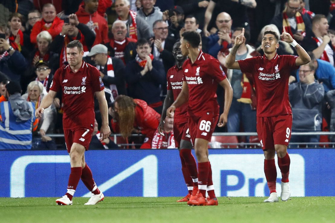 Firmino celebrates after scoring his team's third goal against PSG.
