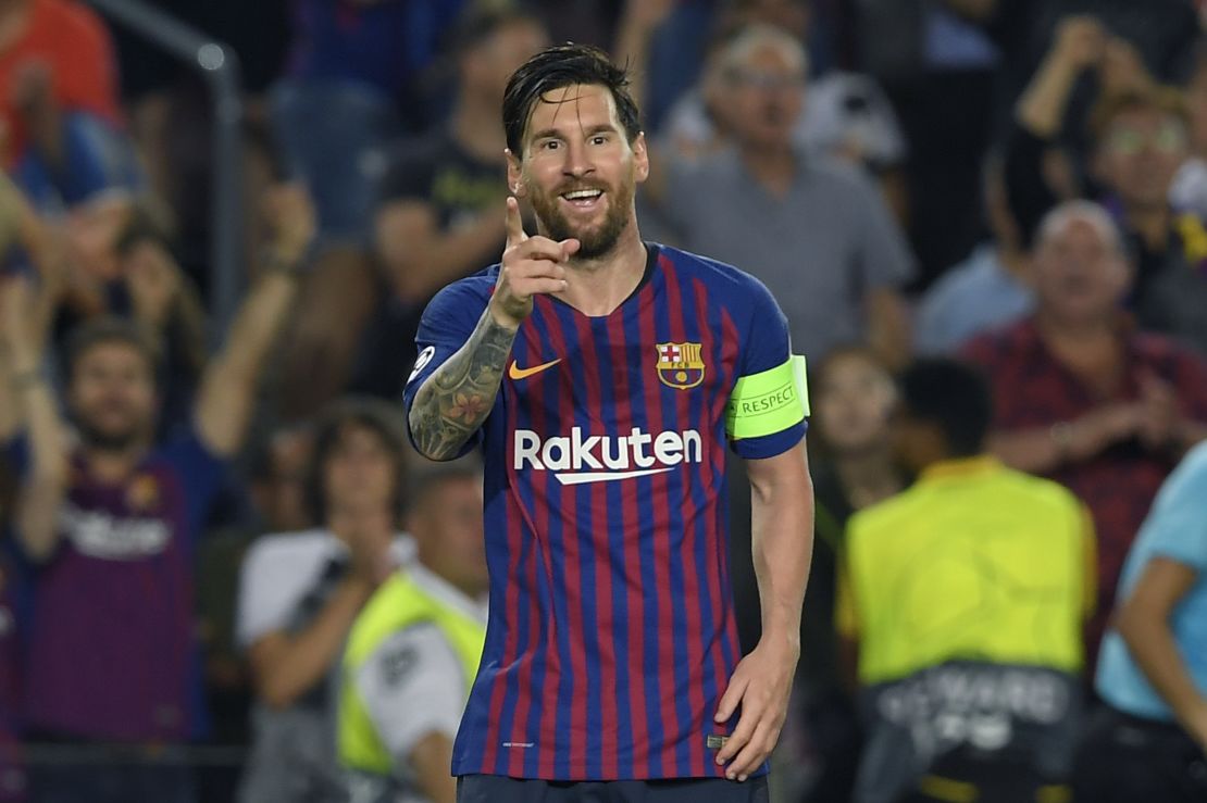 Lionel Messi celebrates after scoring his third goal gainst PSV Eindhoven.