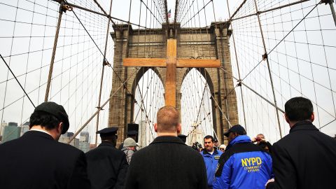 Members of the Diocese of Brooklyn walk over the Brooklyn Bridge in New York City. 