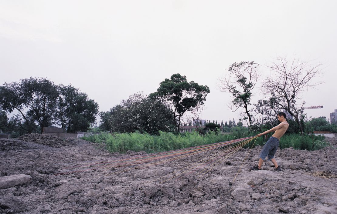 "Haul these stuff - 4" (2007) by Xiang Liqing, whose work often reflects on China's recent social and economic transformation. 