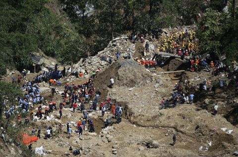 Rescuers in Itogon continue search operations on Wednesday, September 19. Dozens have been confirmed dead in the landslide, and dozens are still missing.