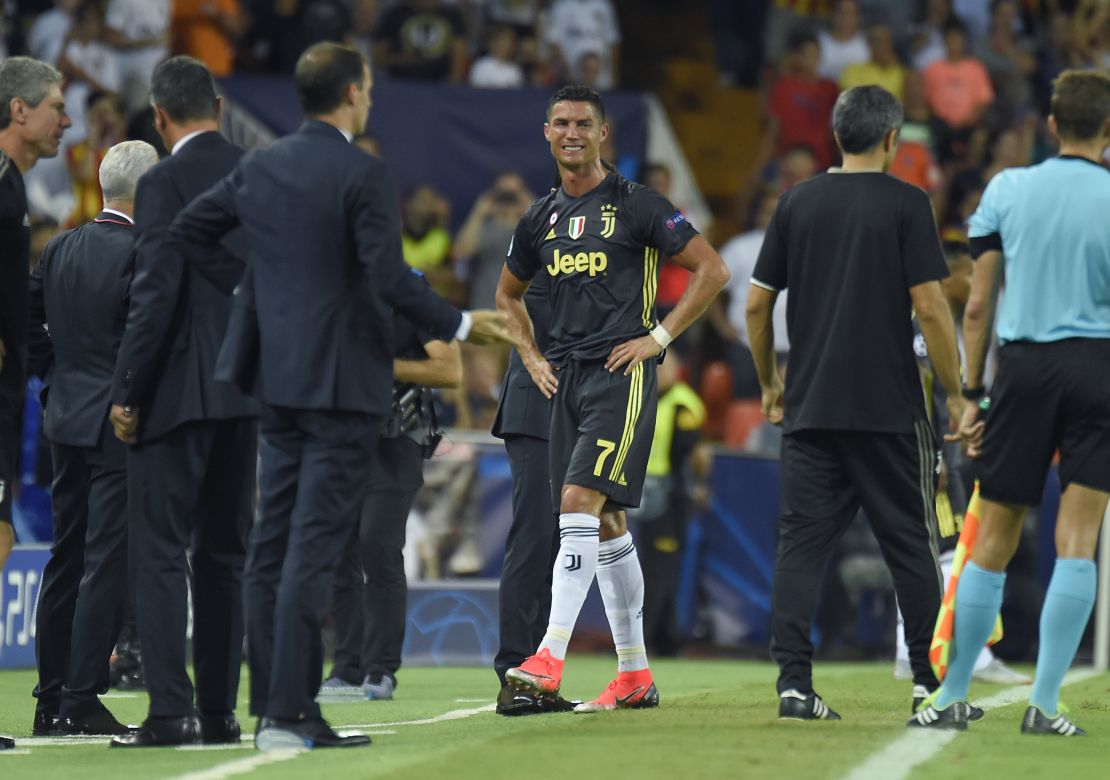 Cristiano Ronaldo leaves the field with tears in his eyes after being sent off during his Champions League debut for Juventus in Valencia. 