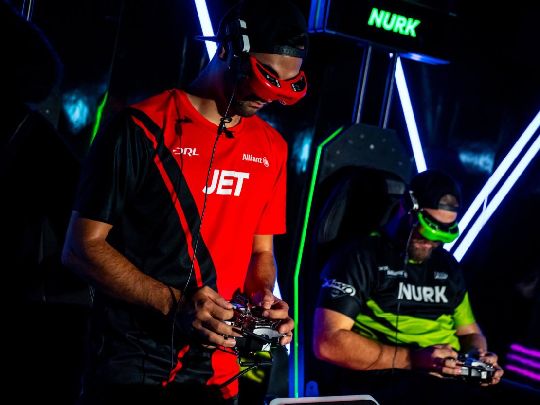 Two-time defending champions JET wears a custom headset which allows him to fly the drone from the perspective of a mounted camera.