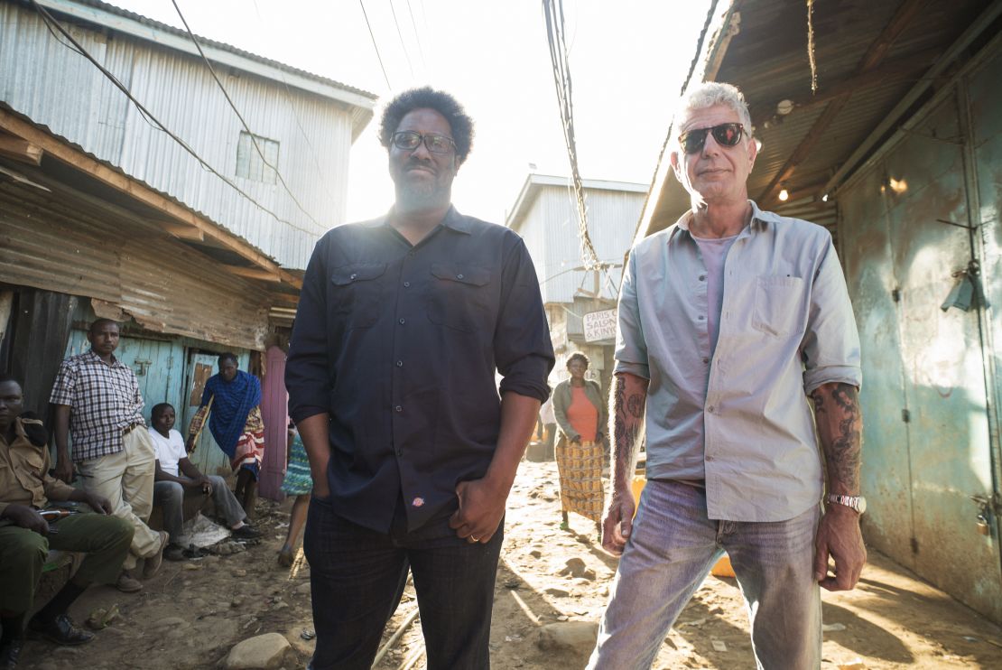 Nairobi, Kenya: Anthony Bourdain with W. Kamau Bell in the Kibera slums during the filming of 'Parts Unknown' season 12.