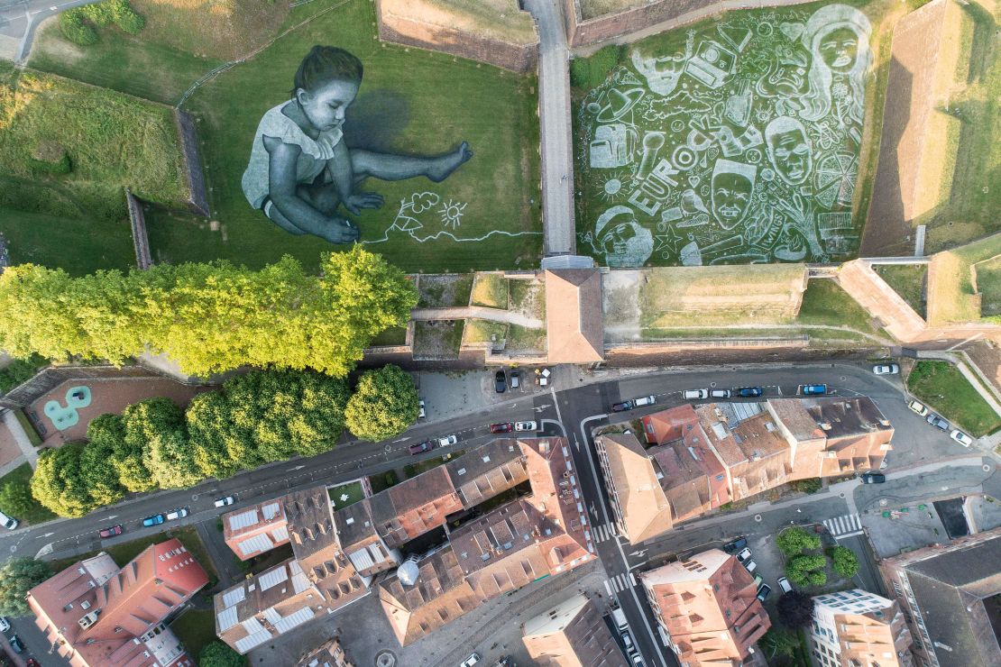 An aerial picture shows a painting made by Saype for the Eurockéennes festival in Belfort, France, in July.