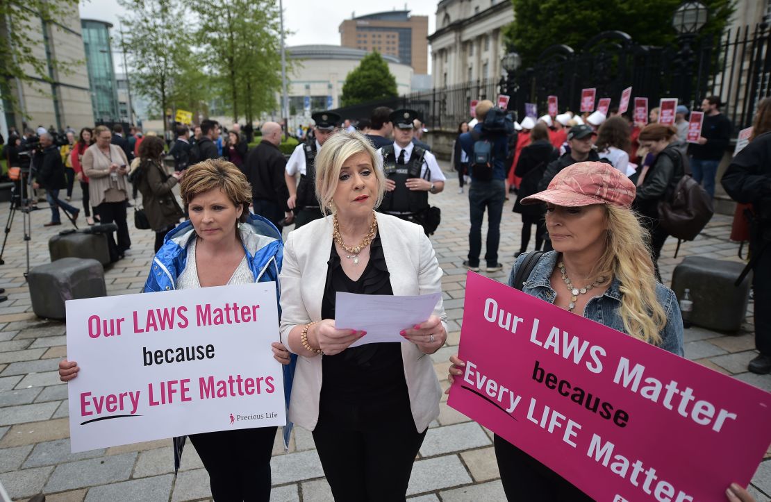 Bernadette Smyth of Precious Lives holds a counter-protest as women call for an end to restrictive abortion laws in Belfast in May.