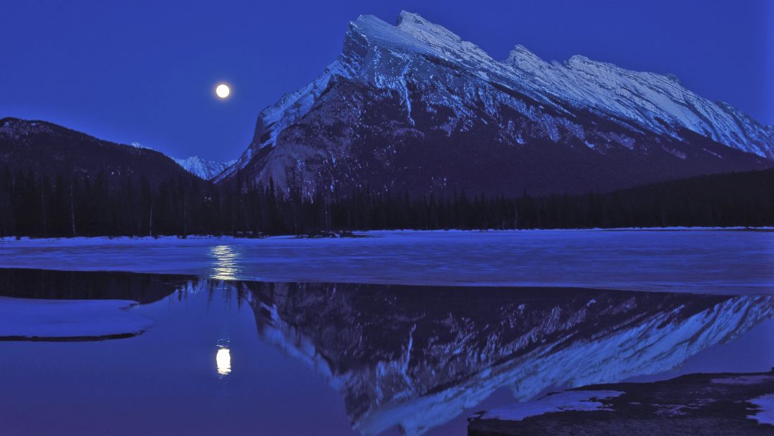 <strong>Banff National Park, Canada:</strong> A full moon rises over Vermilion Lakes. The full moon closest to the fall equinox is often called the harvest moon.