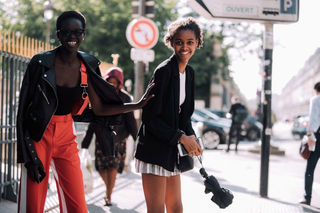 Adut Akech with fellow model Blesnya Minher in Paris.