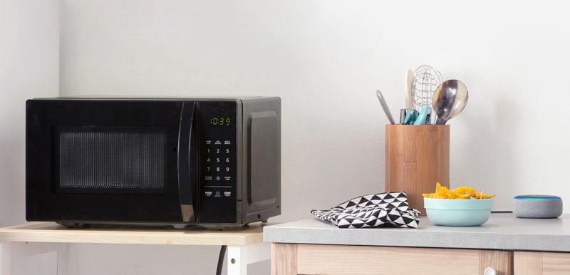Small 700W Basics Microwave Works with Alexa 0.7 Cu Ft 