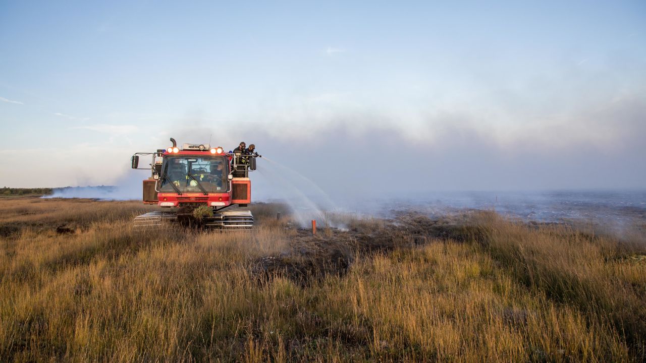 Firefighters work to extinguish the blaze.