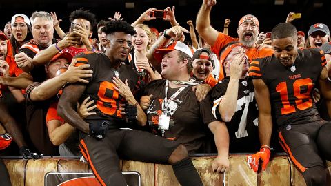 Cleveland Browns' players celebrate with their fans after Thursday's win.