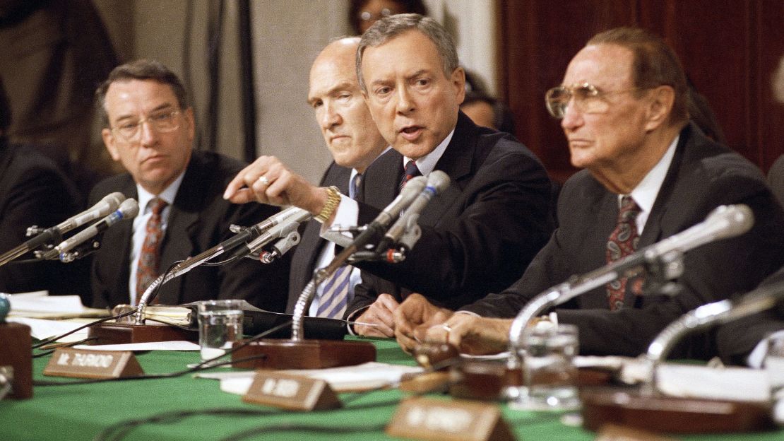 Sen. Orrin Hatch, R-Utah, questions Professor Anita Hill on Friday, Oct. 11, 1991 in Washington during a Senate Judiciary Committee hearing on the nomination of Clarence Thomas to the Supreme Court. Sen. Alan Simpson, R-Wyo., looks on. (AP Photo/John Duricka)
