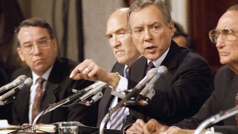 Sen. Orrin Hatch, R-Utah, questions Professor Anita Hill on Friday, Oct. 11, 1991 in Washington during a Senate Judiciary Committee hearing on the nomination of Clarence Thomas to the Supreme Court. Sen. Alan Simpson, R-Wyo., looks on. (AP Photo/John Duricka)