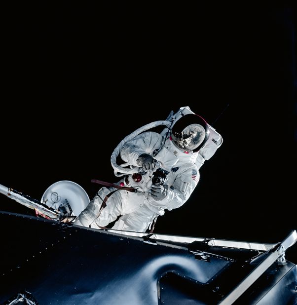 Image shows Lunar Module Pilot Russell Schweickart taking a photograph during his Extravehicular Activity (EVA) testing the new spacesuit during the Apollo 9 mission.