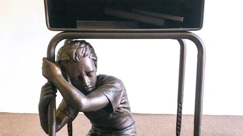 A bronze-coated statue based on the Parkland shooting has a message for voters.