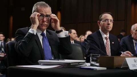 WASHINGTON, DC - JUNE 07: (L-R) Acting FBI Director Andrew McCabe, Deputy Attorney General Rod Rosenstein, Director of National Intelligence Daniel Coats and National Security Agency Director Adm. Michael Rogers testify before the Senate Intelligence Committee in the Hart Senate Office Building on Capitol Hill June 7, 2017 in Washington, DC. The intelligence and security officials testified about re-authorization of Section 702 of the Foreign Intelligence Surveillance Act, which is the law the NSA uses to track emails and phone calls of non-US citizens. (Photo by Chip Somodevilla/Getty Images)