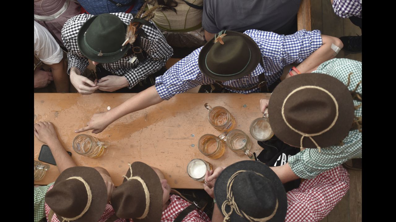 Visitors celebrate in a beer tent at Oktoberfest on September 22.