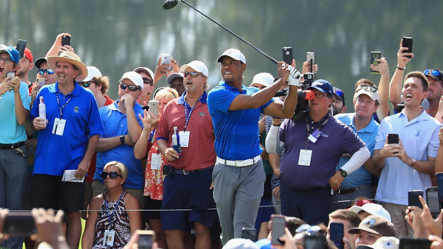 Tiger Woods, shown on the sixth, was  6-under for the round after just seven holes. 