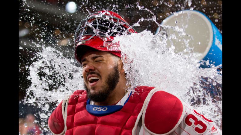 Jorge Alfaro of the Philadelphia Phillies is drenched after the team's win over the New York Mets on Tuesday, September 18, in Philadelphia. The Phillies defeated the Mets 5-2.