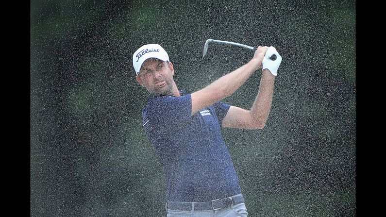 Webb Simpson of the United States plays a shot from a bunker on the seventh hole during the first round of the Tour Championship on Thursday, September 20, in Atlanta.
