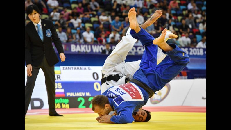 Mikhail Puliaev fights against Georgii Zantaraia at the Judo World Championships in Baku, Azerbaijan, on Friday, September 21.