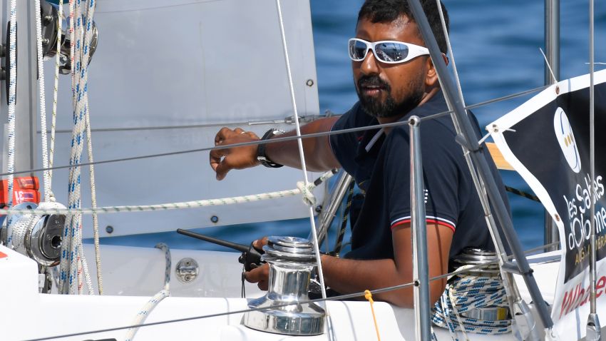 India's Abhilash Tomy gestures on his boat "Thuriya" sets sails from Les Sables d'Olonne Harbour on July 1, 2018, at the start of the solo around-the-world "Golden Globe Race" ocean race in which sailors compete without high technology aides such as GPS or computers. (Photo by Damien MEYER / AFP)        (Photo credit should read DAMIEN MEYER/AFP/Getty Images)