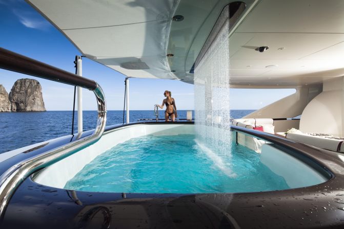 For $38.8M, Heesen Yacht's Quite Essential could be yours. It features a pool with a waterfall, a hammam and a jacuzzi on its sun deck.