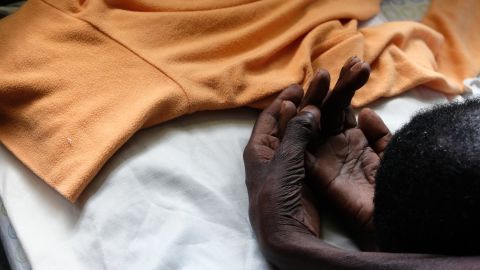 Julia, a  woman dying of oesophageal cancer in Kimbilio hospice in western Kenya.    