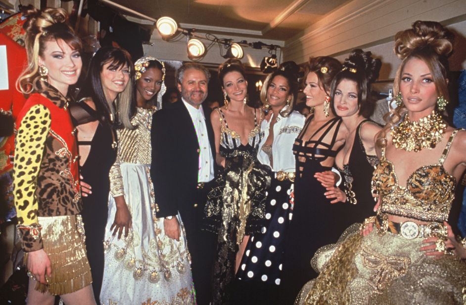 Gianni Versace with models Naomi Campbell, Carla Bruni, Karen Mulder, Christy Turlington after the designer's Spring-Summer 1992 show.