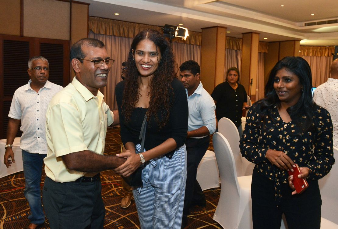 Former president of the Maldives Mohamed Nasheed is congratulated by Solih's supporters  at a hotel in Colombo.
