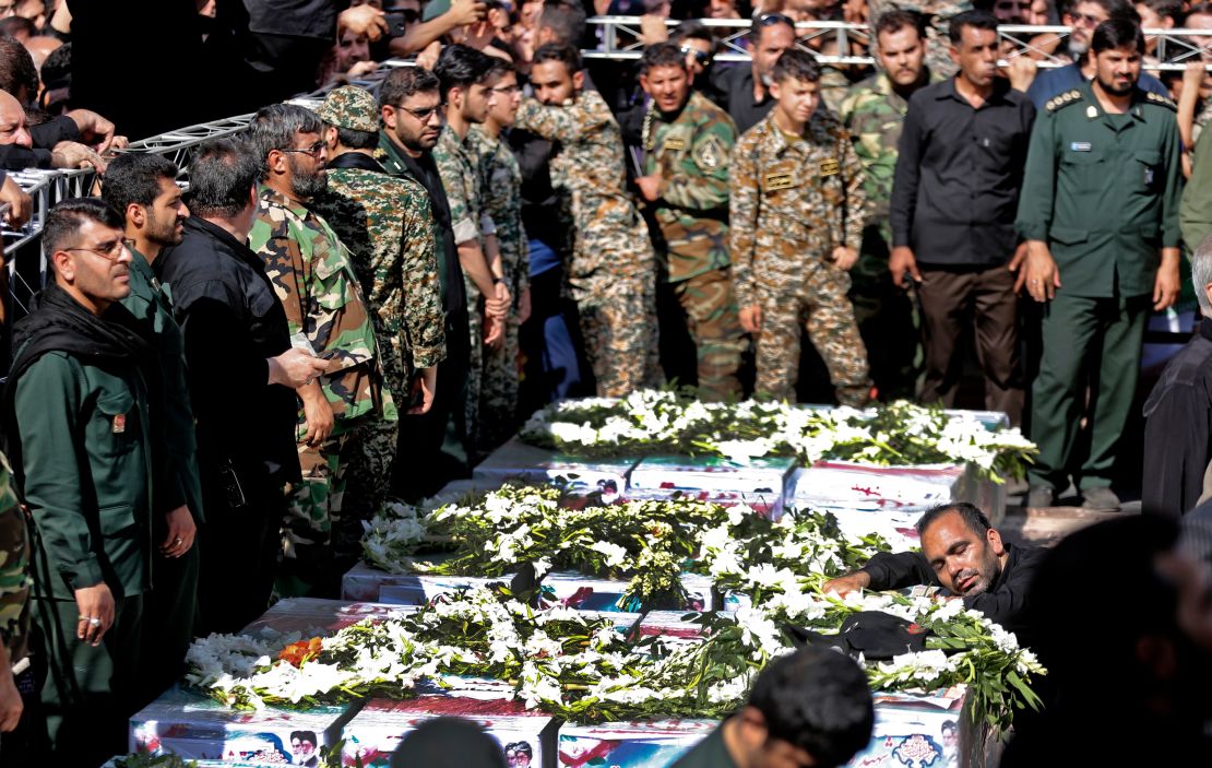 Members of Iranian military mourn during a public funeral for those killed during Saturday's attack in Ahvaz.