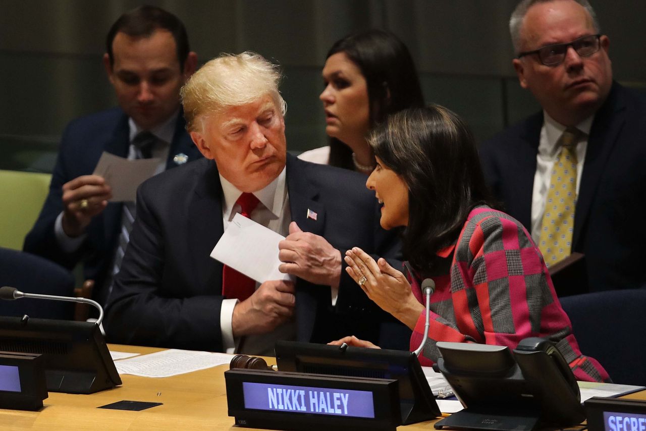 Trump speaks with Nikki Haley, US ambassador to the UN, during Monday's meeting about the global drug crisis.