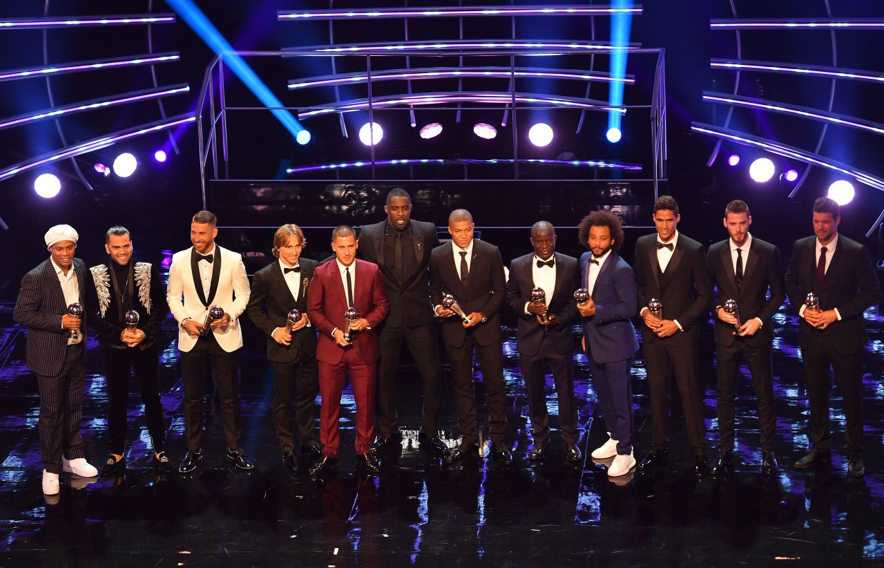The FIFPro World XI awards were presented by former Brazil and Barcelona player Ronaldinho (far left) and Brazil and PSG defender Dani Alves (second to left). 