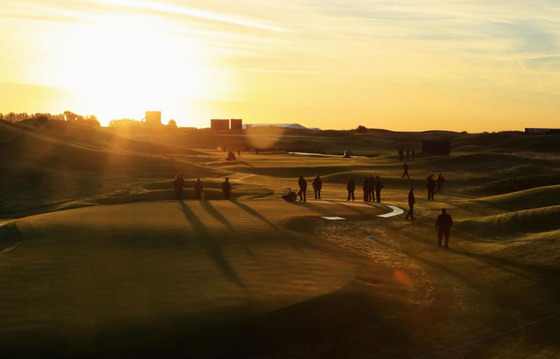 Greenkeepers make the final touches to Le Golf National in Paris ahead of the 2018 Ryder Cup. 