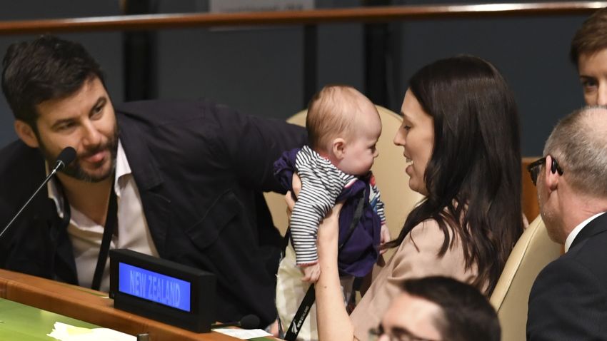 Jacinda Ardern, Prime Minister and Minister for Arts, Culture and Heritage, and National Security and Intelligence of New Zealand holds her daughter Neve Te Aroha Ardern Gayford, as her husband Clarke Gayford (L) looks on during the Nelson Mandela Peace Summit September 24, 2018, one day before the start of the General Debate of the 73rd session of the General Assembly at the United Nations in New York. (Photo by Don EMMERT / AFP)        (Photo credit should read DON EMMERT/AFP/Getty Images)