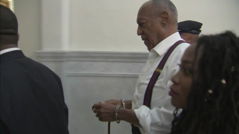 Bill Cosby is taken out of the courtroom in handcuffs after his sentencing Tuesday.