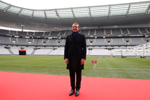 France's president Emmanuel Macron, posing here during a visit to the Stade de France, threw his support behind the 2024 bid.