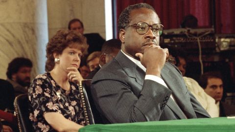 Then-Supreme Court Justice nominee Clarence Thomas and his wife Virginia listen during his nomination hearing before the Senate Judiciary Committee in 1991.