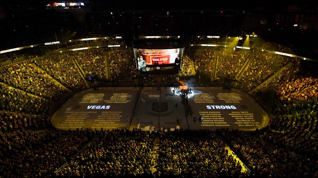 Names of the 58 victims of the October 1, 2017, mass shooting in Las Vegas are projected on the ice at T-Mobile Arena on March 31, 2018 in Las Vegas.