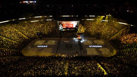 Names of the 58 victims of the October 1, 2017, mass shooting in Las Vegas are projected on the ice at T-Mobile Arena on March 31, 2018 in Las Vegas.