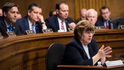 UNITED STATES - SEPTEMBER 27: Rachel Mitchell, counsel for Senate Judiciary Committee Republicans, questions Dr. Christine Blasey Ford as Senators, from left, Ben Sasse, R-Neb., Ted Cruz, R-Texas, Mike Lee, R-Utah.,  and John Cornyn, R-Texas, listen during the Senate Judiciary Committee hearing on the nomination of Brett M. Kavanaugh to be an associate justice of the Supreme Court of the United States, focusing on allegations of sexual assault by Kavanaugh against Christine Blasey Ford in the early 1980s. (Photo By Tom Williams/CQ Roll Call/POOL)