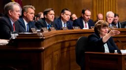 UNITED STATES - SEPTEMBER 27: Rachel Mitchell, counsel for Senate Judiciary Committee Republicans, questions Dr. Christine Blasey Ford as Senators, from left, Mike Crapo, R-Idaho, Jeff Flake, R-Ariz., Ben Sasse, R-Neb., Ted Cruz, R-Texas, Mike Lee, R-Utah., and John Cornyn, R-Texas, listen during the Senate Judiciary Committee hearing on the nomination of Brett M. Kavanaugh to be an associate justice of the Supreme Court of the United States, focusing on allegations of sexual assault by Kavanaugh against Christine Blasey Ford in the early 1980s. (Photo By Tom Williams/CQ Roll Call/POOL)