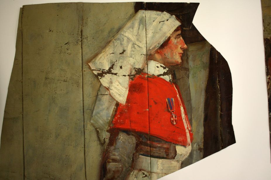 After a US tour that lasted until 1940, the painting was sent back to a storage company in Baltimore which kept it outside in a 55-foot crate, as it was too big to to keep indoors. This fragment shows a British nursing sister.
