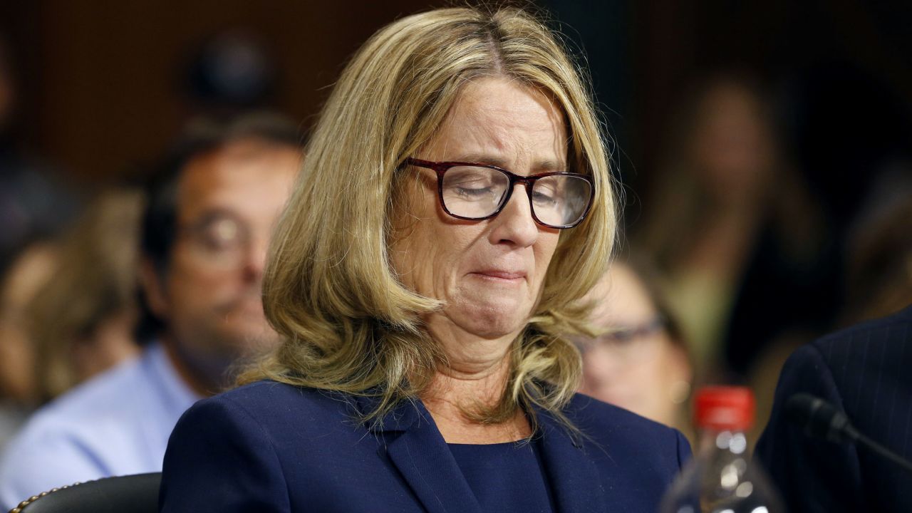 Christine Blasey Ford reacts as she speaks before the Senate Judiciary Committee hearing on the nomination of Brett Kavanaugh to be an associate justice of the Supreme Court of the United States, on Capitol Hill in Washington, DC, U.S., September 27, 2018. Michael Reynolds/Pool via REUTERS