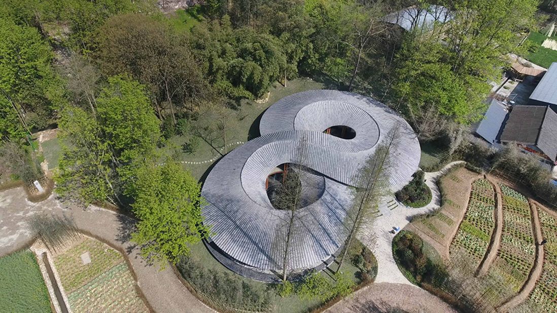 "In Bamboo" is an exhibition space and cultural center in Daoming, Sichuan province. "My dream is that technology is not only serving the big city but can also go to the common people in China," says Philip Yuan, the founder of Archi-Union Architects. 