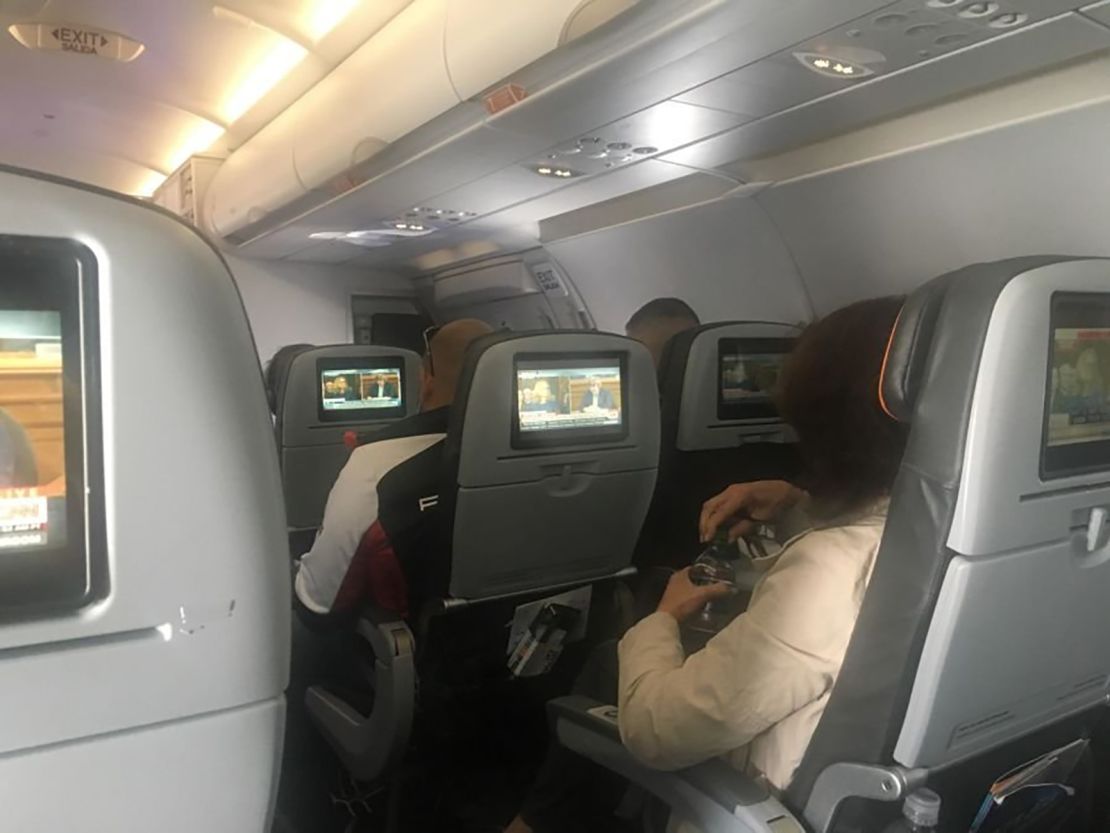 Passengers watching the hearing on a JetBlue flight from New York to San Francisco. 