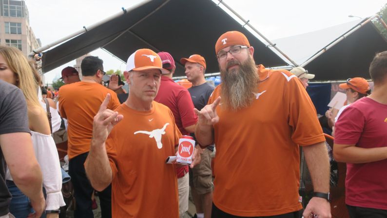 Texas Longhorns fan Steve Lawrence (left) has been tailgating for 11 years, but prefers to remain in the parking lot rather than attend the games. "I get tickets all the time, and I get rid of them," he said, before the Texas - USC game on September 15.