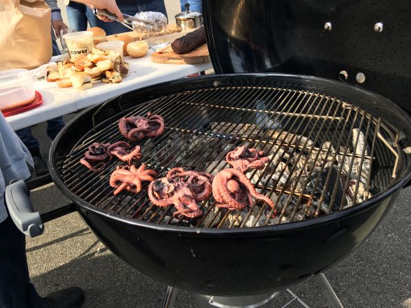 Grilled squid is part of the menu at the Uberoi tailgate for Giants games 